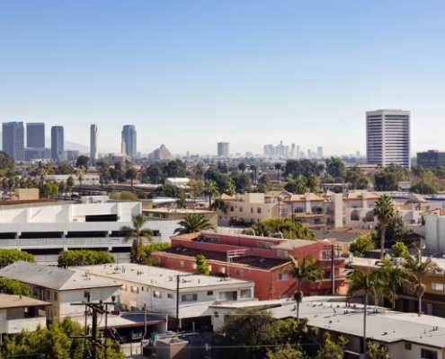 Image of housing in Los Angeles with skyline in the distance