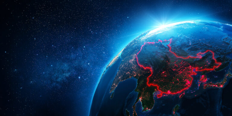 stock photo represents China outlined on a globe as seen from space