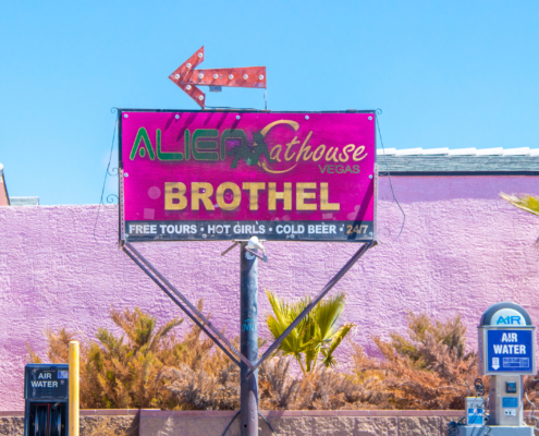 image of a road sign for an adult business
