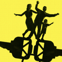 Silhouette of mother, father and child balance on a large set of keys