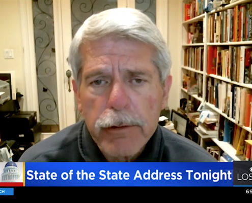 Man speaking on television news