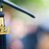 Closeup of a 2021 Graduation Tassel at a graduation ceremony.