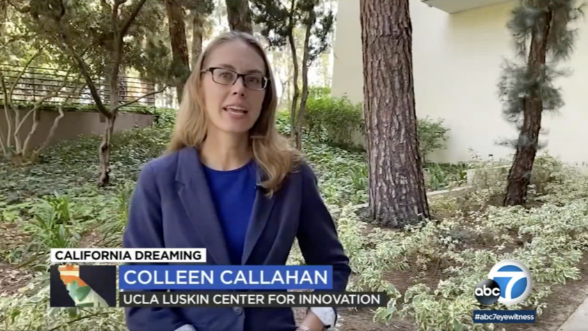 Woman wearing glasses and a blue blazer speaking in a garden at UCLA in an excerpt from ABC7 News