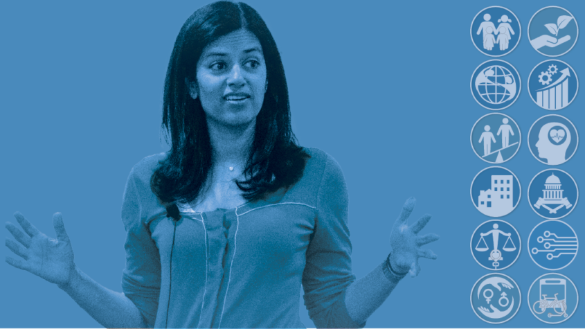 Image of Professor Shah speaking and gesturing with her hands with a blue overlay.