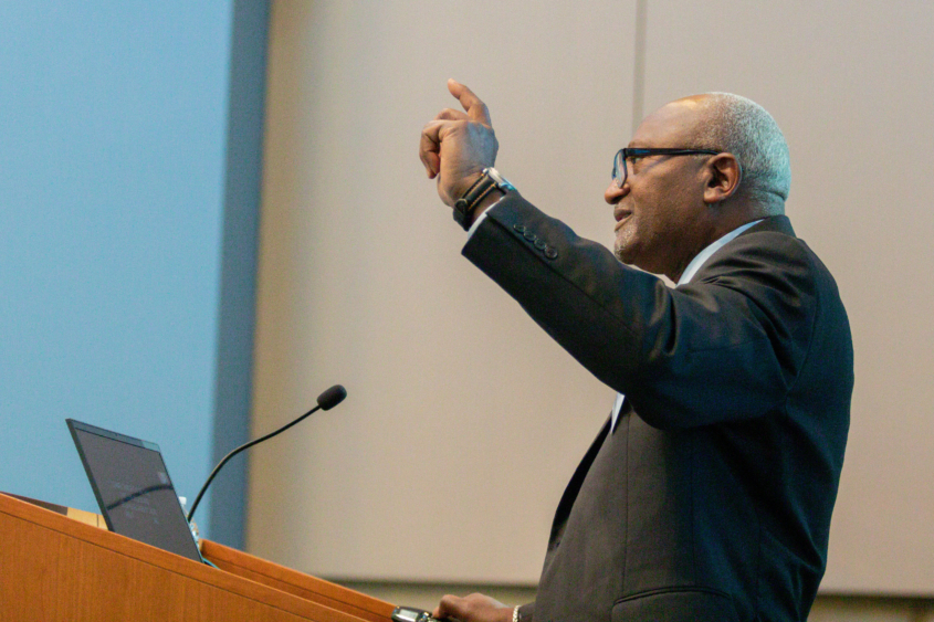 African American Robert Bullard gestures during a talk at UCLA