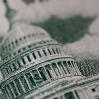 closeup of government capitol building on U.S. currency