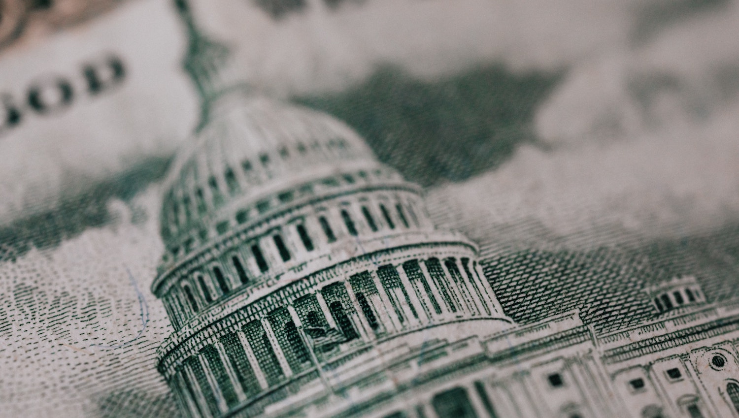 closeup of government capitol building on U.S. currency