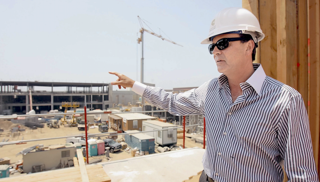 Man in hardhat at construction site