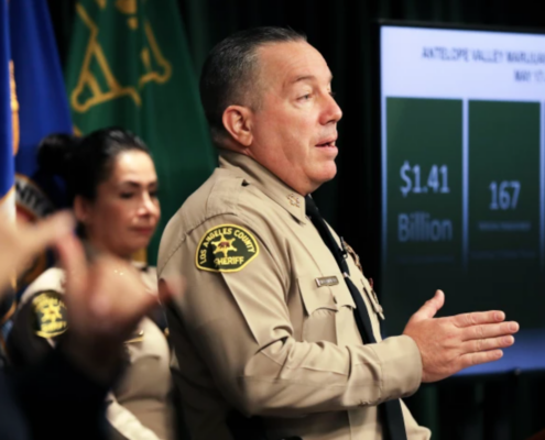 Man in sheriff uniform at podium