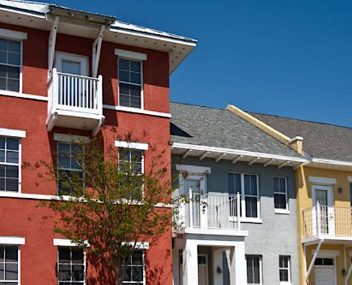row of colorful apartment buildings