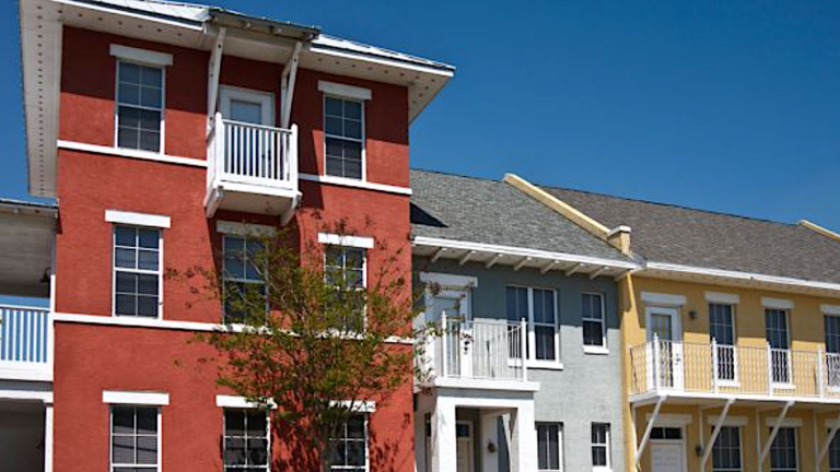 row of colorful apartment buildings