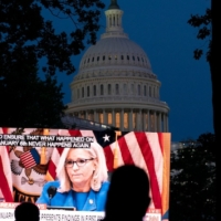 televised hearing shown in parnear U.S. Capitol building