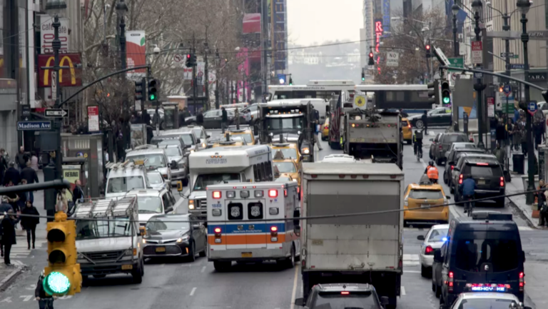 street congested with cars in Manhattan