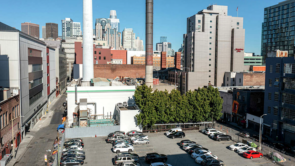 parking lot next to buildings