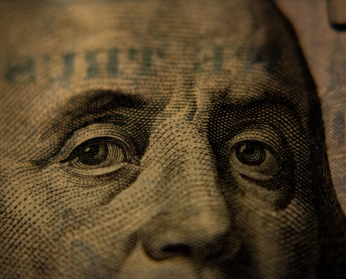A closeup of a U.S. hundred-dollar bill (Benjamin Franklin side).