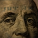 A closeup of a U.S. hundred-dollar bill (Benjamin Franklin side).