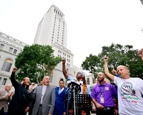 crowd of protesters in front of L.A. City Hall