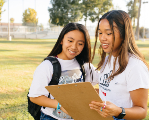 Two girls with clipboard