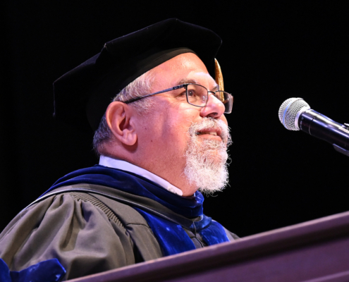 graduation speaker at podium