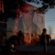Woman in front of Trump campaign truck