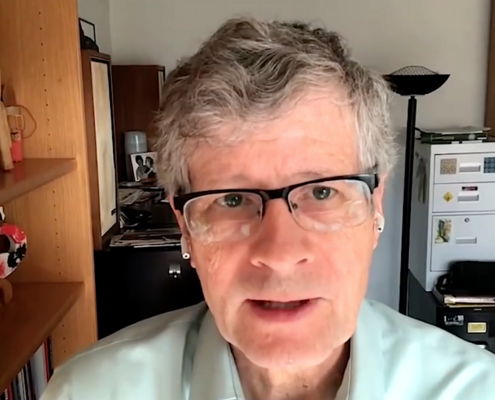 Headshot of man in glasses