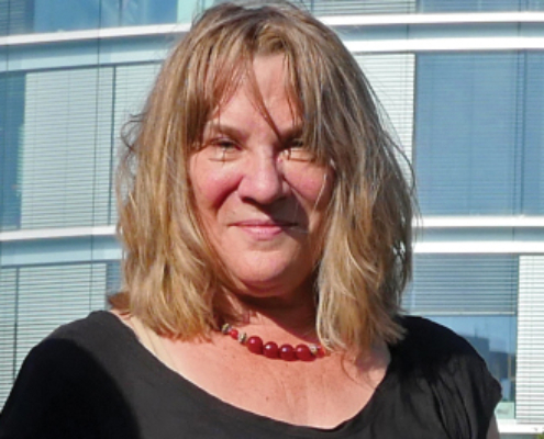 portrait of woman outside a building