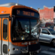 orange bus on city street