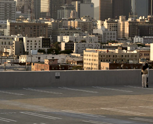 empty parking lot next to L.A. skyline