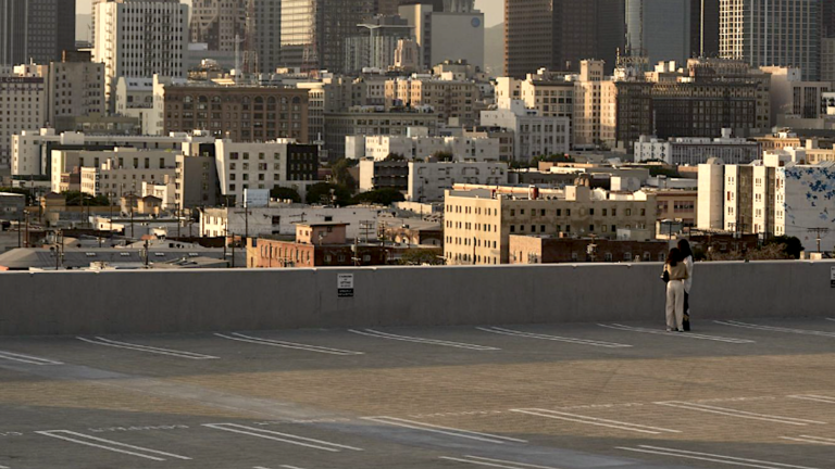 empty parking lot next to L.A. skyline
