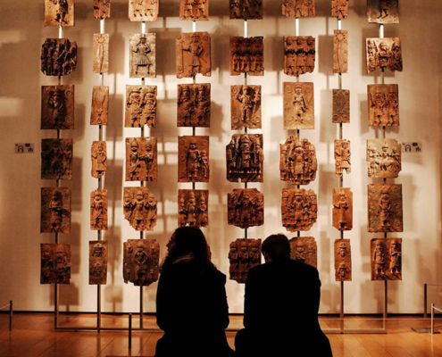 bronze art on wall in museum