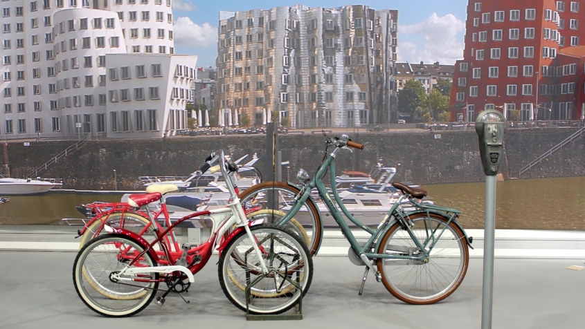 bicycles, parking meter and city skyline