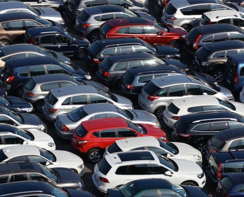 cars crowded together in a lot