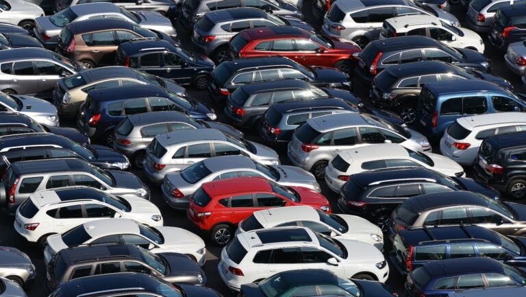 cars crowded together in a lot