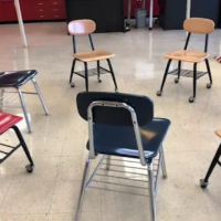 Child-size school chairs in circle