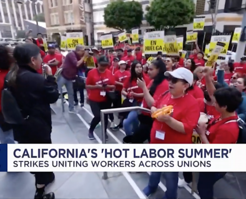 television news image of strikers
