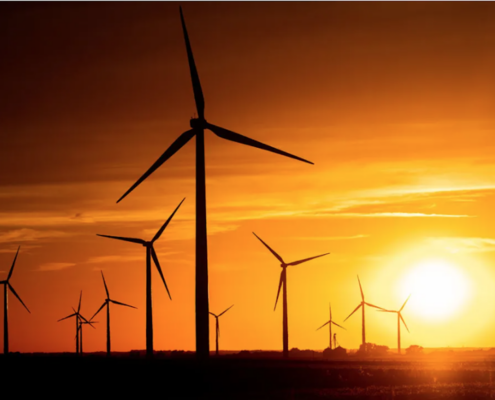 Wind turbines at sunset