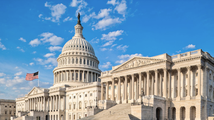 Photo of U.S. Capitol building set against blue sky