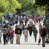 students walking on college campus