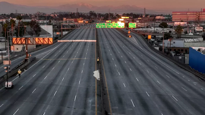 empty stretch of freeway in Los Angeles at dawn