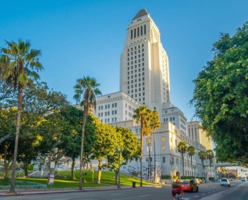 tall white building against blue sky