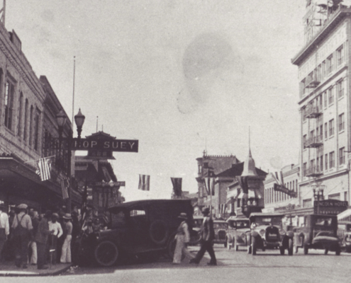 black and white historic photo of business district