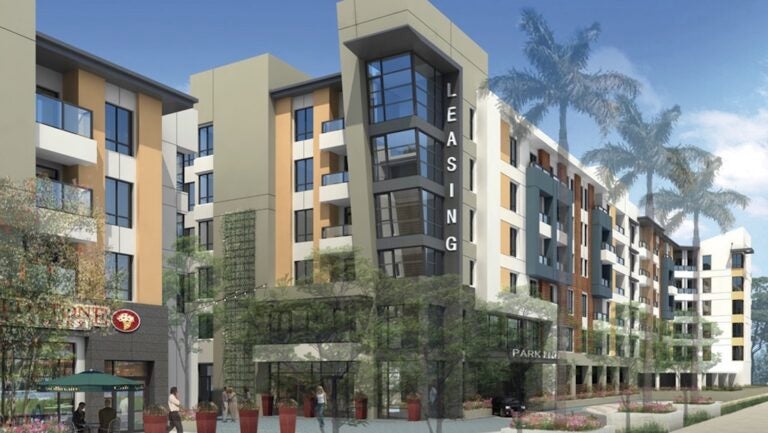 drawing of housing units with "Leasing" sign