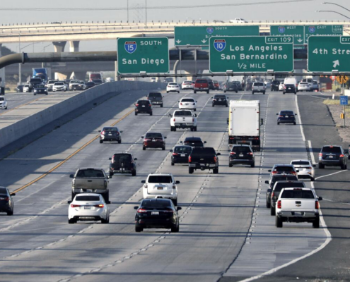 Cars moving along a freeway