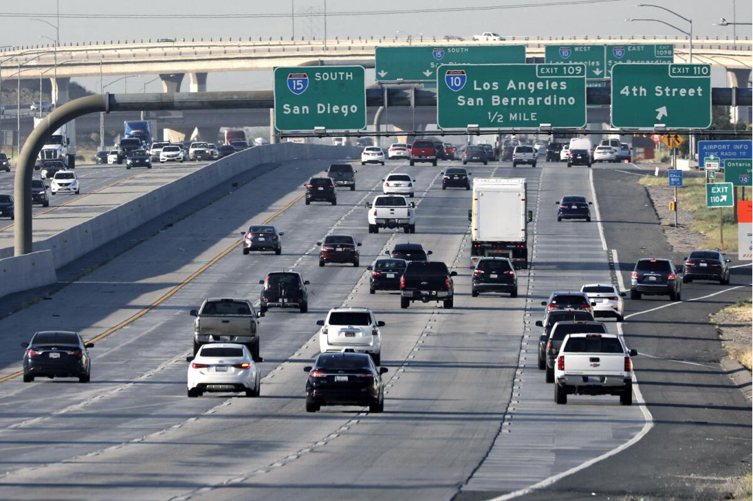 Cars moving along a freeway