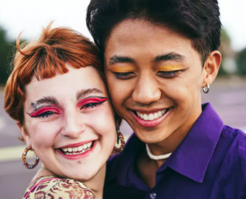 two youths smiling