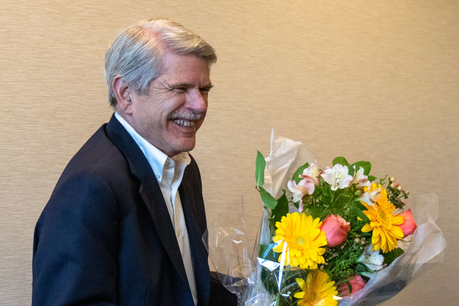 Man with bouquet of flowers