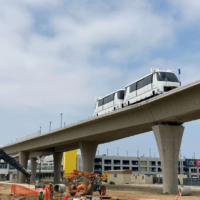 elevated train on concrete track under construction