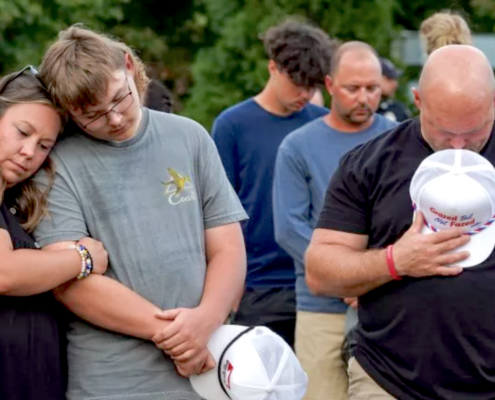 adults and students at vigil