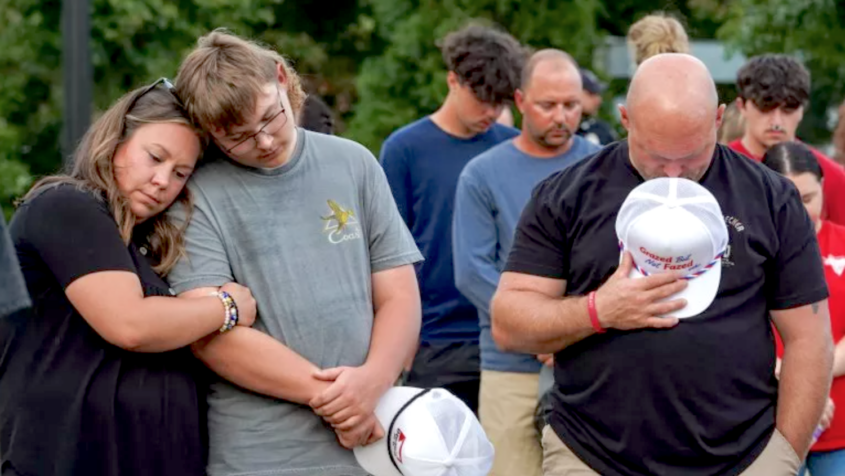 adults and students at vigil