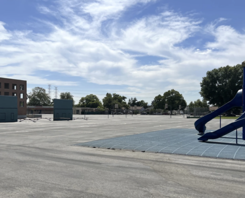 school playground with asphalt and little shade